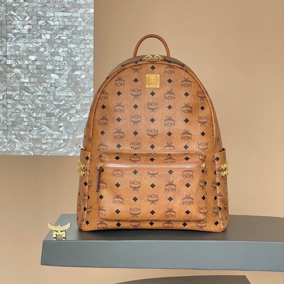 MCM Handbags - MCM Tan Leather Backpack/purse with Gold Accents